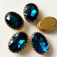 Овал в ажурній золотій оправі Колір Blue Zircon Розмір 13х18мм