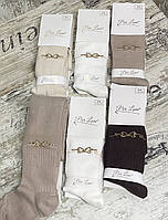 Світлі колготки для дівчаток у рубчик знизу по ніжці