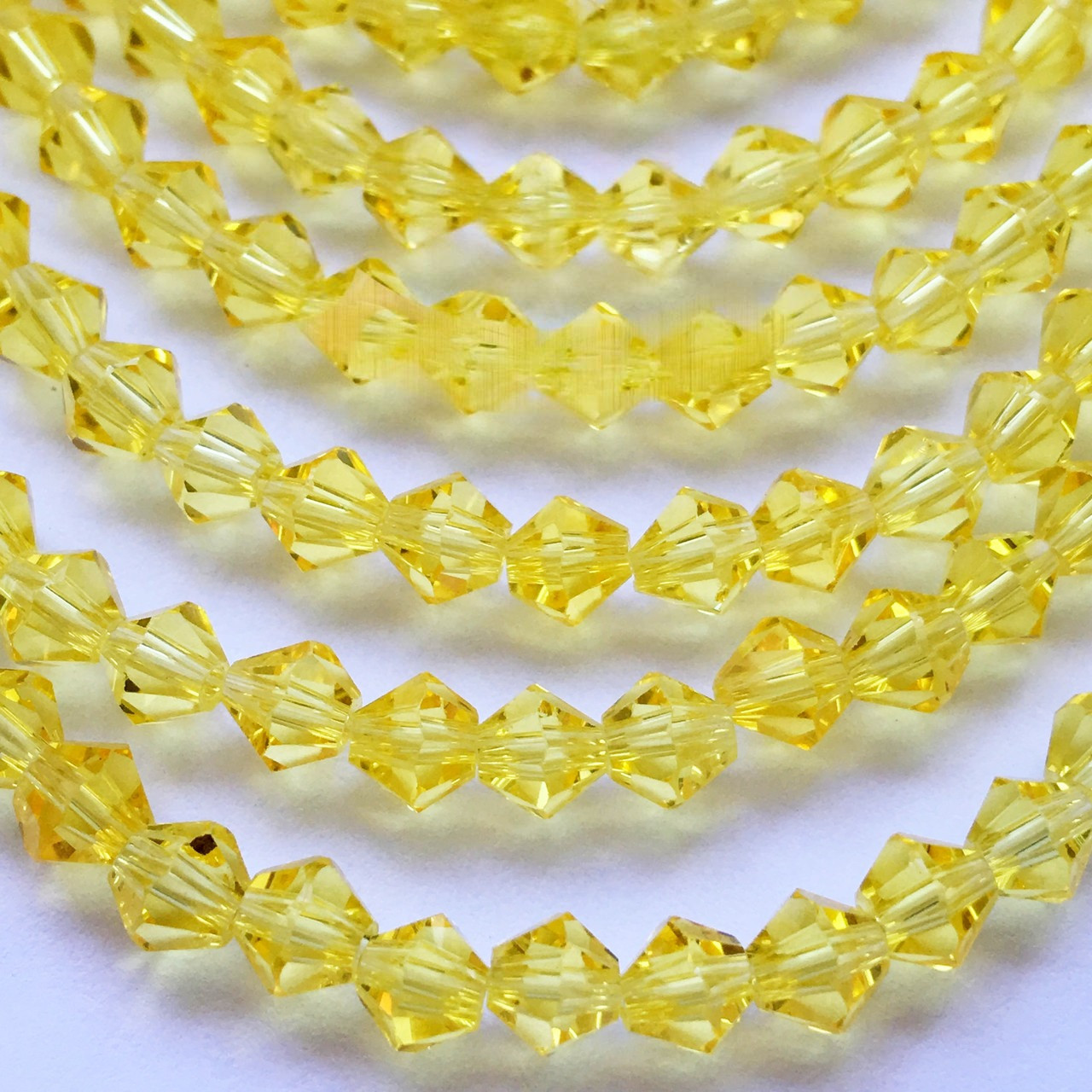 Біконуси скло 4 мм Колір Jonquil, 1 шт.