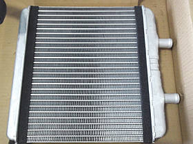 Радиатор печки с патрубками Daily 99-02