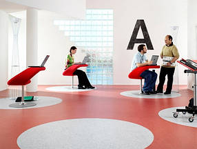 Укладання монтаж комерційного лінолеуму з дизайном