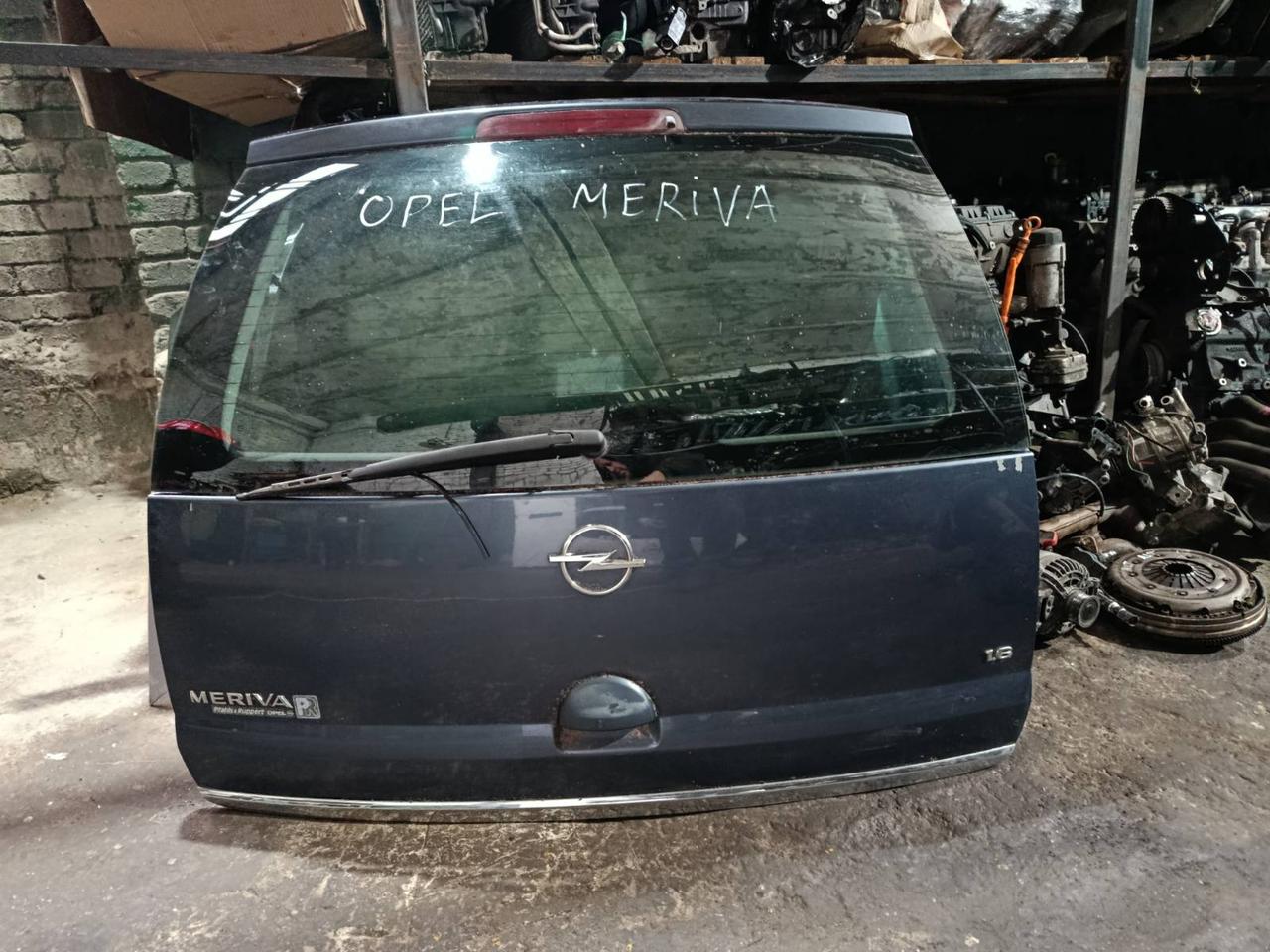 Вітаю зацікавлених на авто розборці Чемпіон !!!<br />
 Предметом оголошення є&nbsp;Кришка Багажника Opel Meriva A Кляпа Двері Задній 93174370 126291<br />
 Фактичний стан на фото. Гарантія 14 днів на встановлення та перевірку<br />
 Висилаємо по всій Україні по передоплаті на транспортні витрати!<br />
 Наявність та асортимент на складі постійно змінюються.<br />
 Точні деталі уточняйте по телефону +380973363743 — фото 1