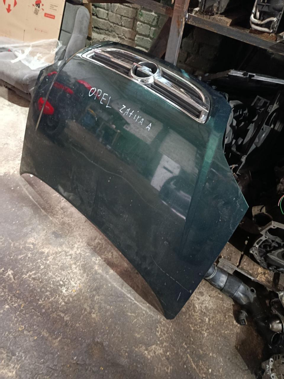 Вітаю зацікавлених на авто розборці Чемпіон !!!<br />
 Предметом оголошення є&nbsp;Капот Opel Zafira A 93170620 1160239<br />
 Фактичний стан на фото. Гарантія 14 днів на встановлення та перевірку<br />
 Висилаємо по всій Україні по передоплаті на транспортні витрати!<br />
 Наявність та асортимент на складі постійно змінюються.<br />
 Точні деталі уточняйте по телефону +380973363743 — фото 4