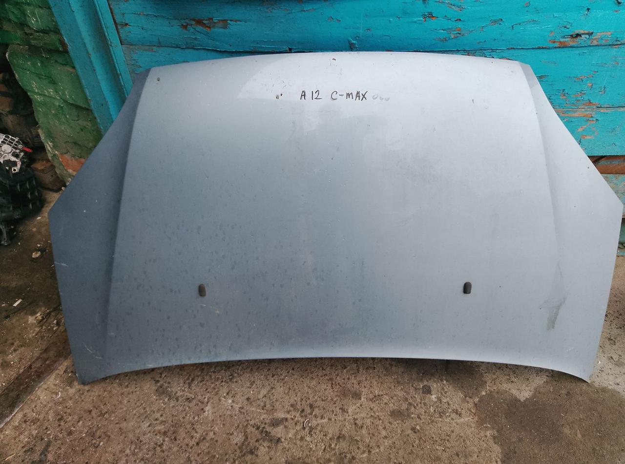 Вітаю зацікавлених на авто розборці Чемпіон !!!<br />
 Предметом оголошення є&nbsp;Капот Ford Focus C Max До Рестайлінг 1252640 1372089<br />
 Фактичний стан на фото. Гарантія 14 днів на встановлення та перевірку<br />
 Висилаємо по всій Україні по передоплаті на транспортні витрати!<br />
 Наявність та асортимент на складі постійно змінюються.<br />
 Точні деталі уточняйте по телефону +380973363743 — фото 1