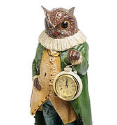 Статуетки сов, папуг, інших птахів