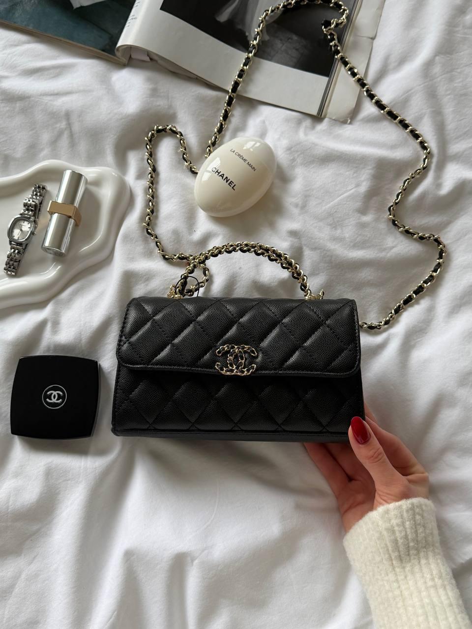 Chanel long flap wallet in black grained shiny