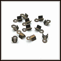 Затискач для стрічок 0,6*0,3 см бронза