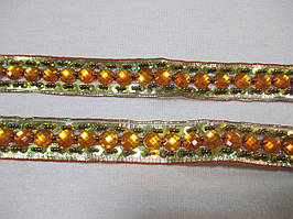 Тасьма  зі стразами "На тасьмі" 22 мм, золотиста з жовтим. Тесьма со стразами