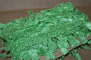 Плетена тасьма зелена з дзвіночками