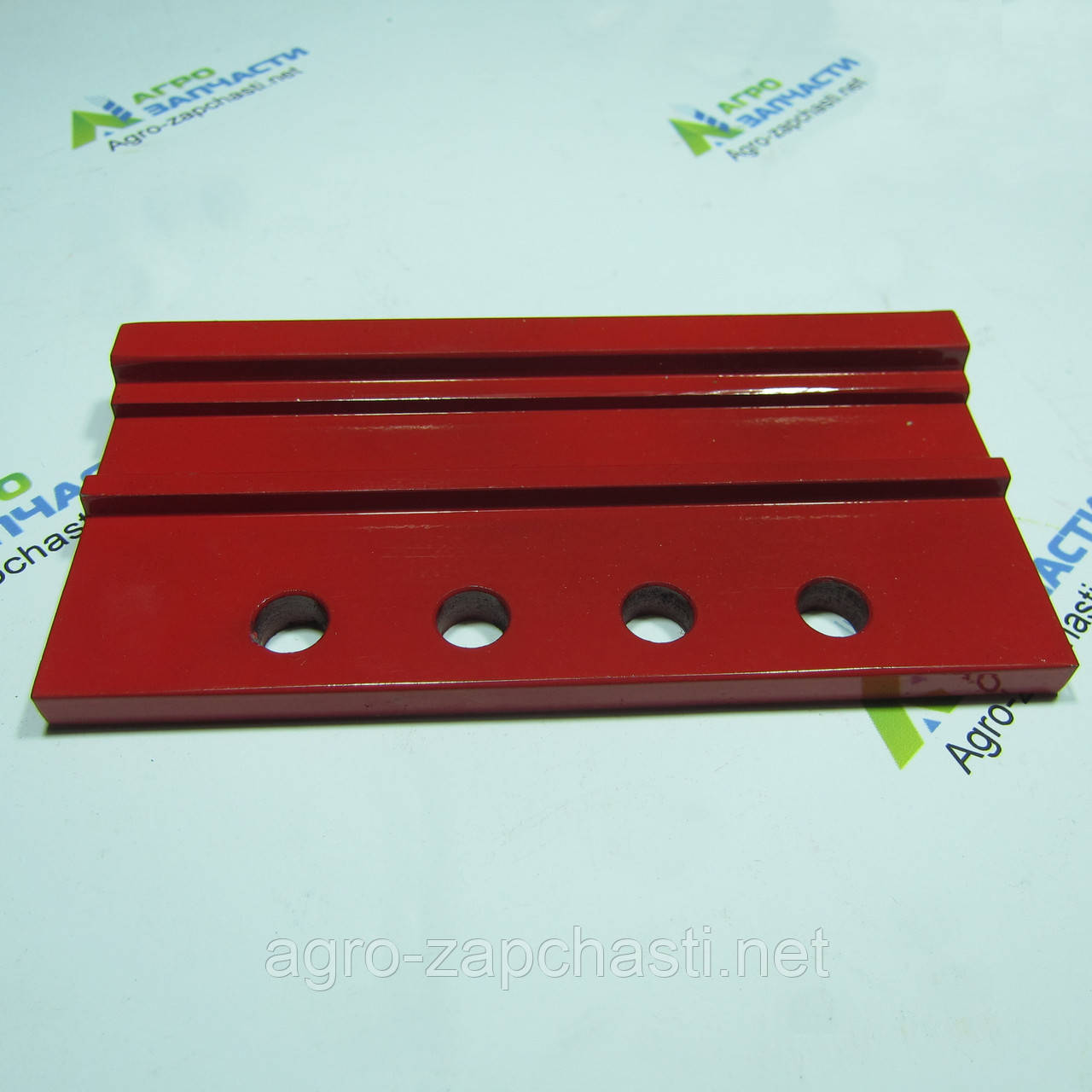 Напрямна головки коси жатки 404410M1-G  Massey Ferguson,   140х7х18мм