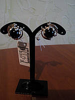 Срібні сережки з напайками золота та оніксом