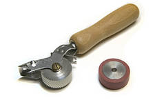 Профільований прикочувальний ролик для зварки митної стрічки