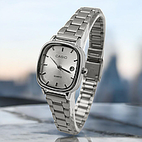 Женские часы Casio классический аналоговый с датой серебристый прямоугольный