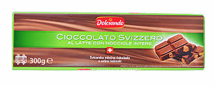 Молочний шоколад "Dolciando Cioccolato Svizzero con Nocciole", (з цільним фундуком), 300 г.