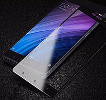 Захисне скло з чорними рамками для Xiaomi Redmi 4 prime (pro) чорне 2,5d  