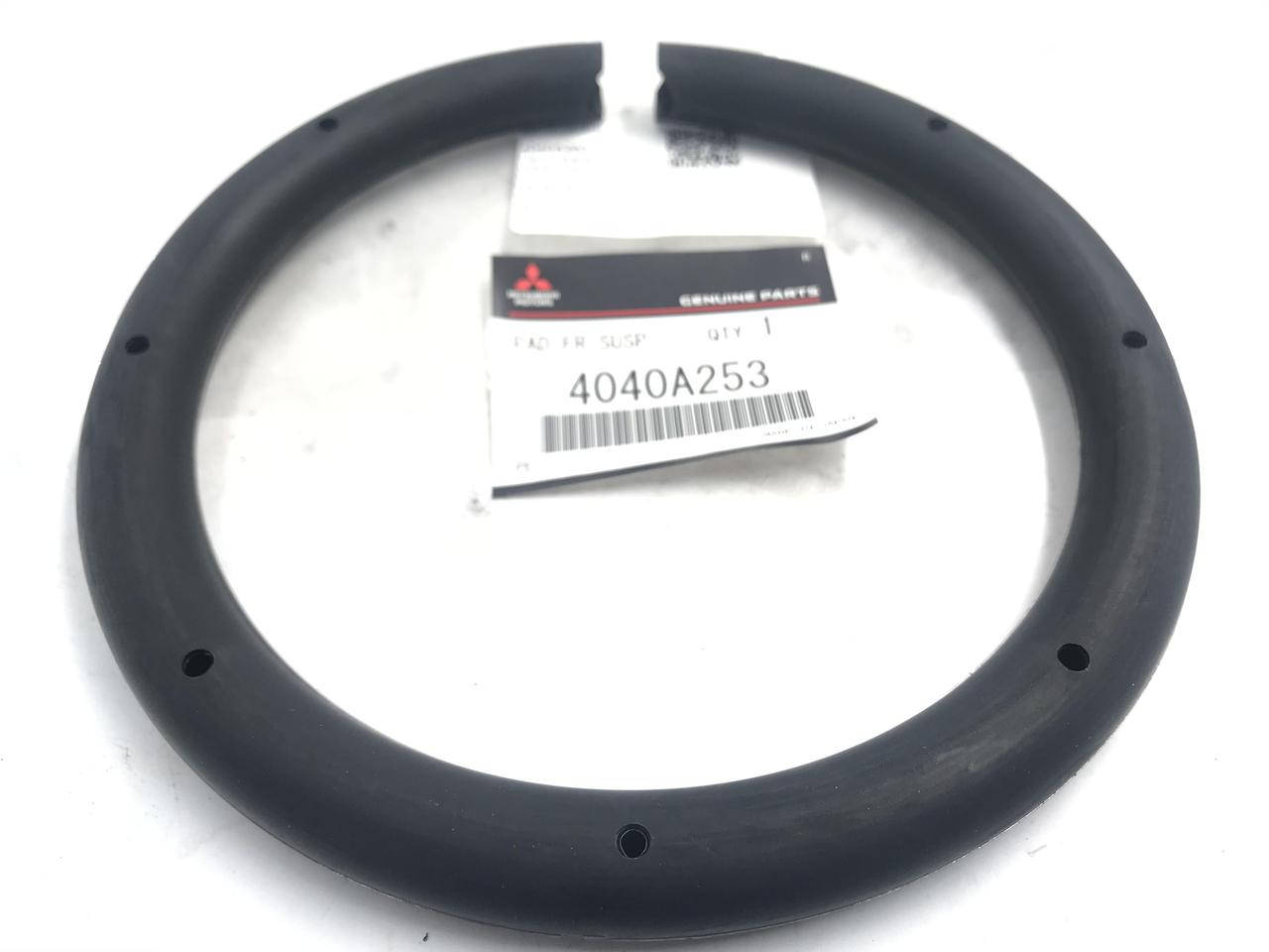 

Проставка пружини передньої нижня 4040A253. MITSUBISHI