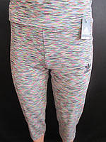 Бриджі спортивні меланжевого кольору.