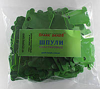 Шпули пластиковые (140 шт). Цвет - зеленый