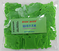 Шпули пластиковые (140 шт). Цвет - салатовый