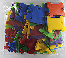 Шпулі пластикові (140 шт.). Мікс із 7 кольорів