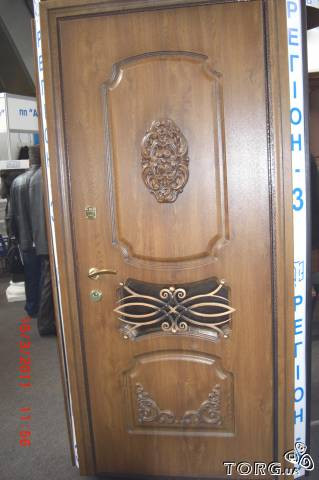 Двері вхідні металеві з дубовими накладками і склопакетом - фото 6 - id-p2256098