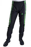 Чоловічі спортивні штани Adidas чорного кольору із зеленими смужками (плащівка). Хмельницький