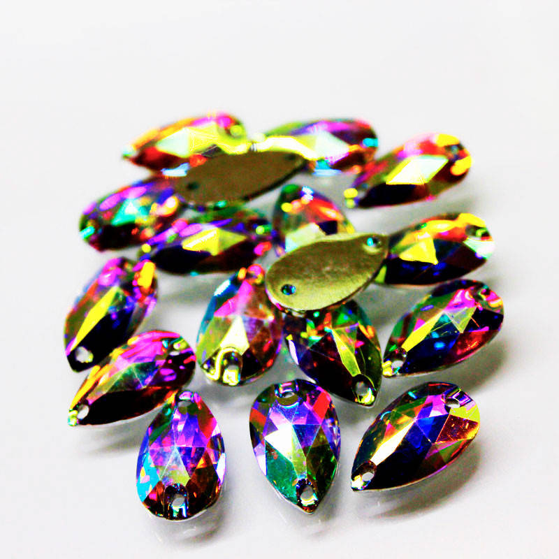 

Пришивные стразы(синтетич.стекло),7х12 Форма Капля, Crystal AB(хамелеон), 1шт