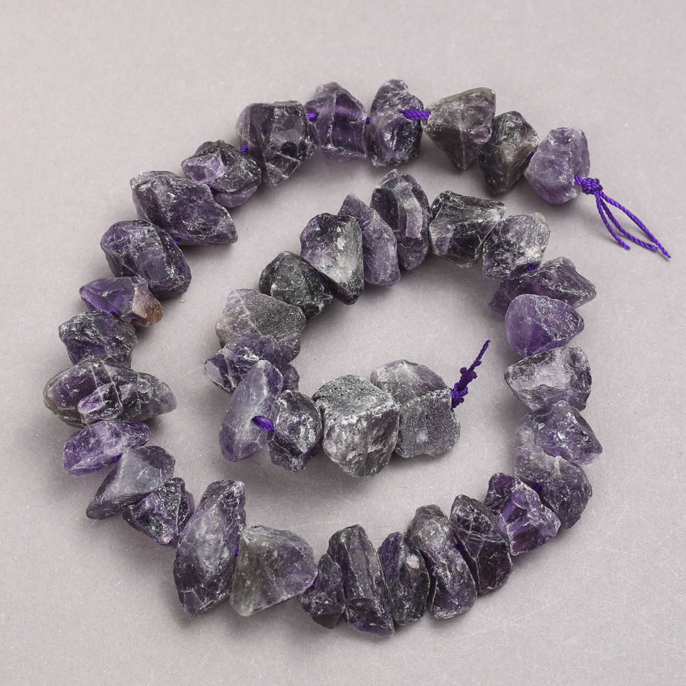 

Бусины необработанный камень Аметист на нитке галтовка d-10х18мм+- L-42см+-