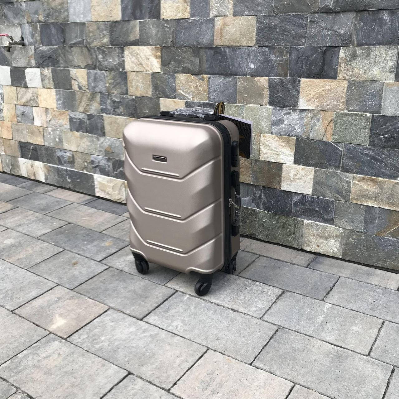 

Чемодан дорожный  Wings 147 S Шампань