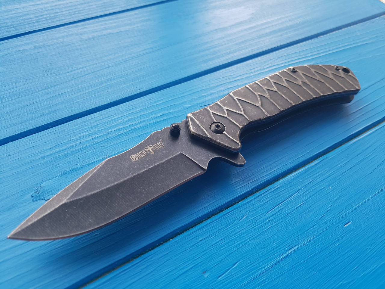 

Нож туристический складной ,надежный steel 1