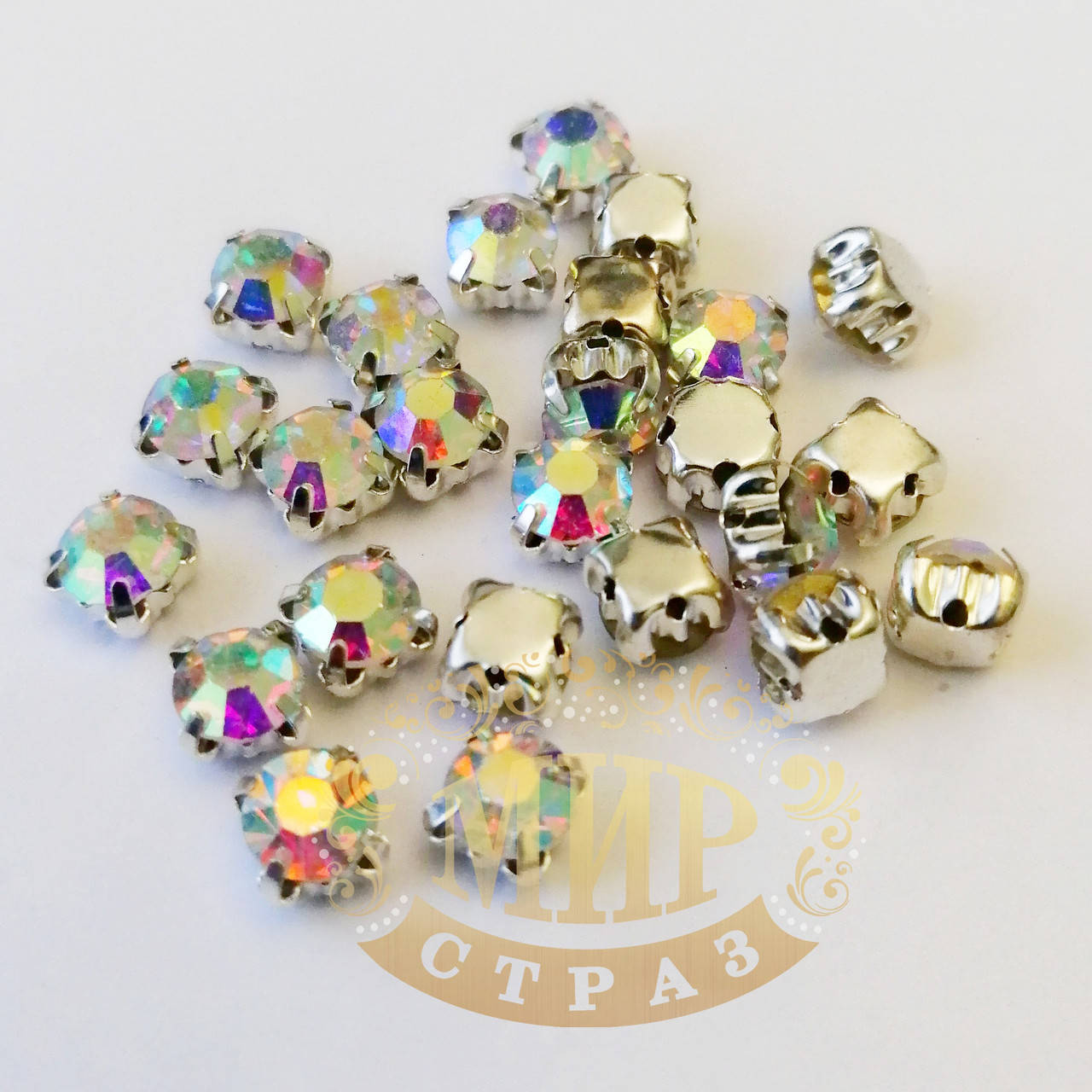 

Стразы в цапах чатоны 6мм,цвет Crystal AB, 1шт, Белый
