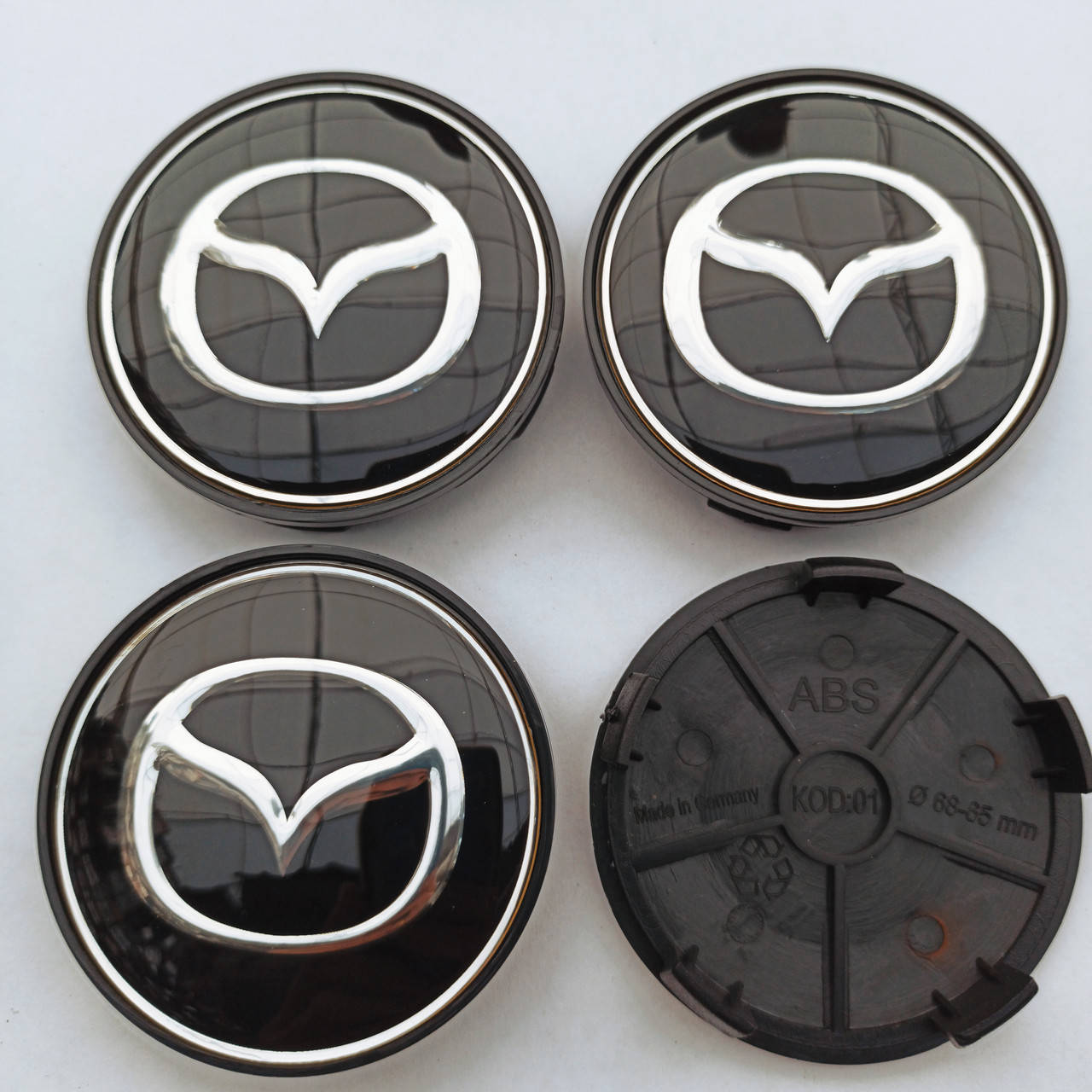 

Колпачки в диски Mazda 65-68 мм черные