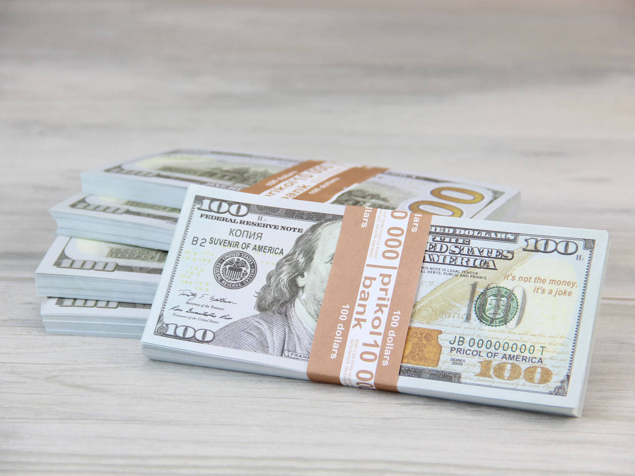 

Сувенирные деньги "100$ доллар сувенирный Нового образца" упаковка 80 купюр