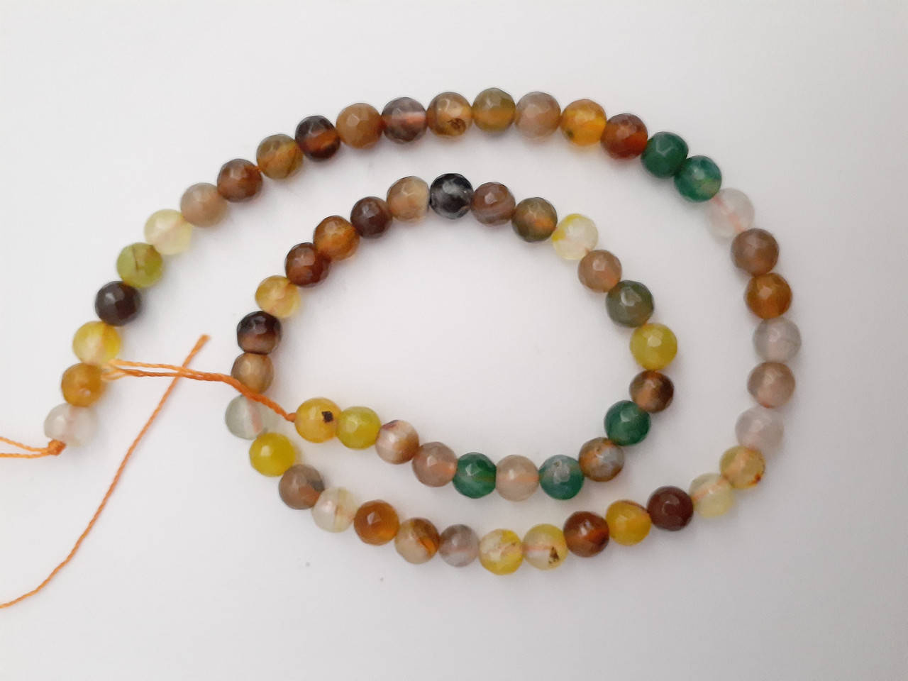 

Бусины на нитке Агат граненный шарик d-6мм(+-) L-37см