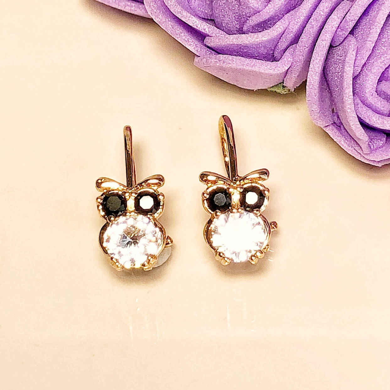 

Серьги ЕА 1811, Белый, Черный фианит, Размер 16*5 мм, позолота РО