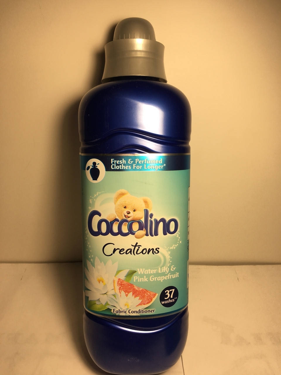 

Ополіскувач Coccolino Creations лілія грейпфрут 37 прань 925мл.