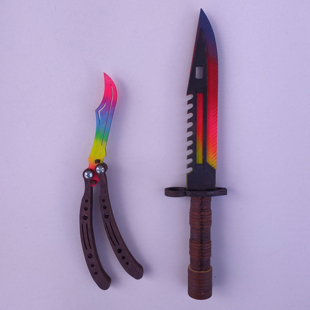 

Набор деревянных ножей из игры CS:GO (КС:ГО) 2 шт. Нож Бабочка, Штык Нож. Цвет: Градиент. Цена за набор.