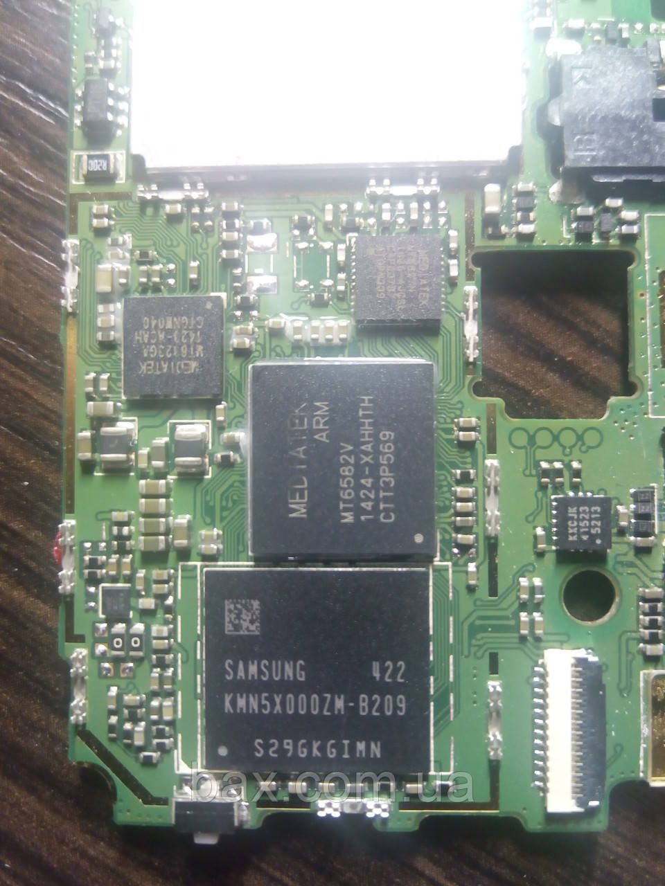 Мікросхема пам'яті Samsung KMN5X000ZM-B209 На платі Опис