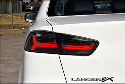 Альтернативна задня оптика Lancer X тюнінг-оптика димчаста Audi style