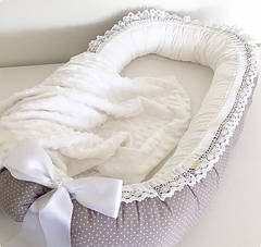 Кокон позиціонер для новонароджених