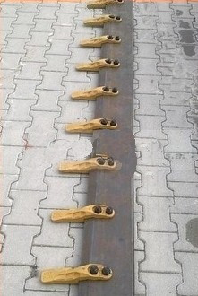 Ніж ковша (різальна крайка) JCB 3CX 4CX 2450X200X20 ПІД 9 ЗУБІВ 500HB 123/05119