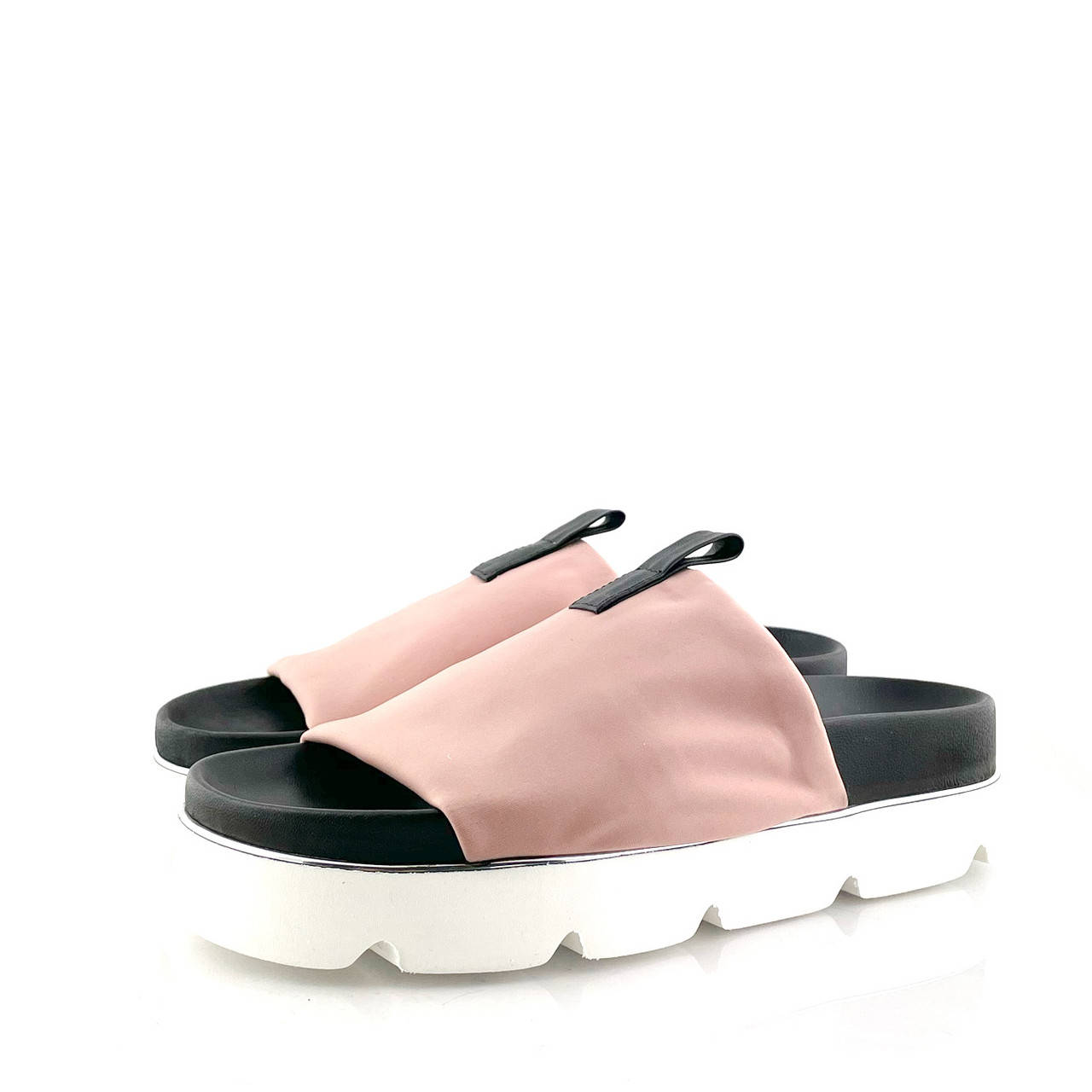 

Сабо Tucino кожаные на платформе со стечём бежевые с черным