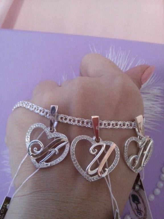 

Серебряные подвесы буква"Г"