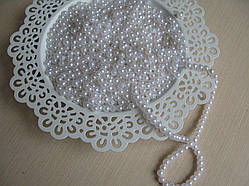 Перли білий діаметр намистин 0,5 см. Вага паковання 10 г