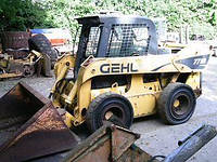 Мини погрузчик GEHL 7710 с цельнолитыми шинами (типа бобкет, Bobcat)