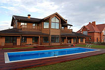 Вот так выглядит дом из профилированного бруса.