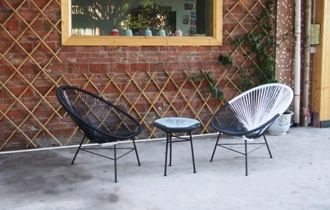 Купити дизайнерське крісло плетене з ротанга у вітальню