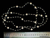 Бусины на леске кремовый (шампань) перламутр (5 шт. - 3 мм. + 1 шт. - 8 мм.). Длина - 1,2 м.