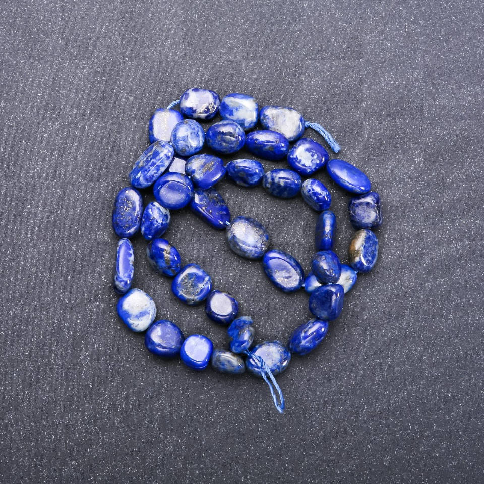 

Бусины натуральный камень Лазурит нитка галтовка d-9х14мм L-38см (+-)