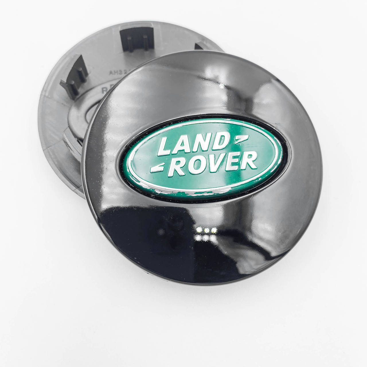 

Колпачки (заглушки) в литые диски LEND ROVER (Ровер) 62 мм Зеленый лого Черные